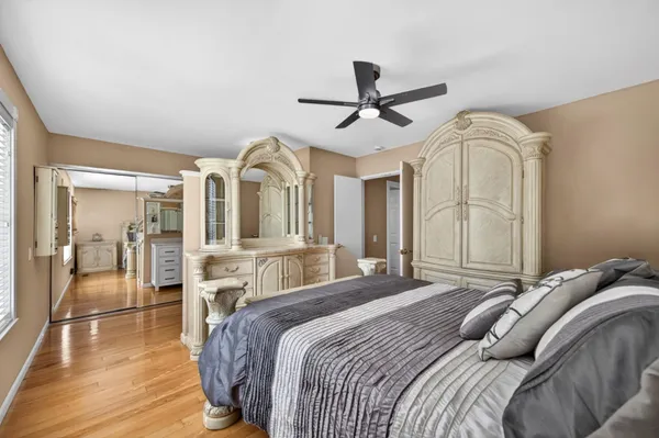 a kitchen with granite countertop a sink stove and cabinets