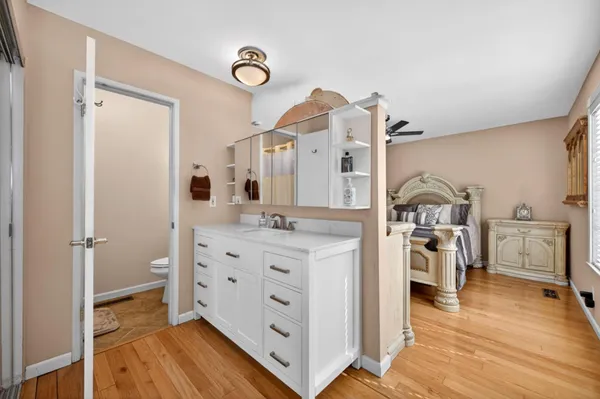a kitchen with stainless steel appliances a sink stove and cabinets