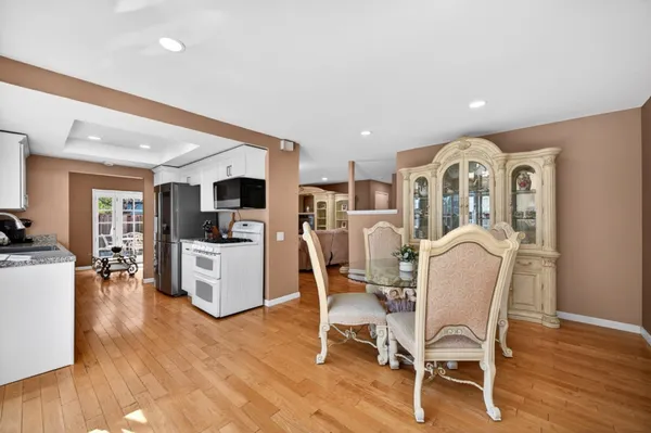 a view of a backyard with a patio