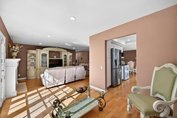 a view of a backyard with wooden fence