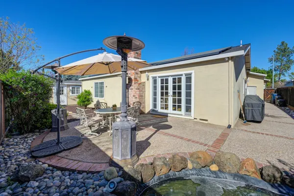 a bedroom with furniture and windows