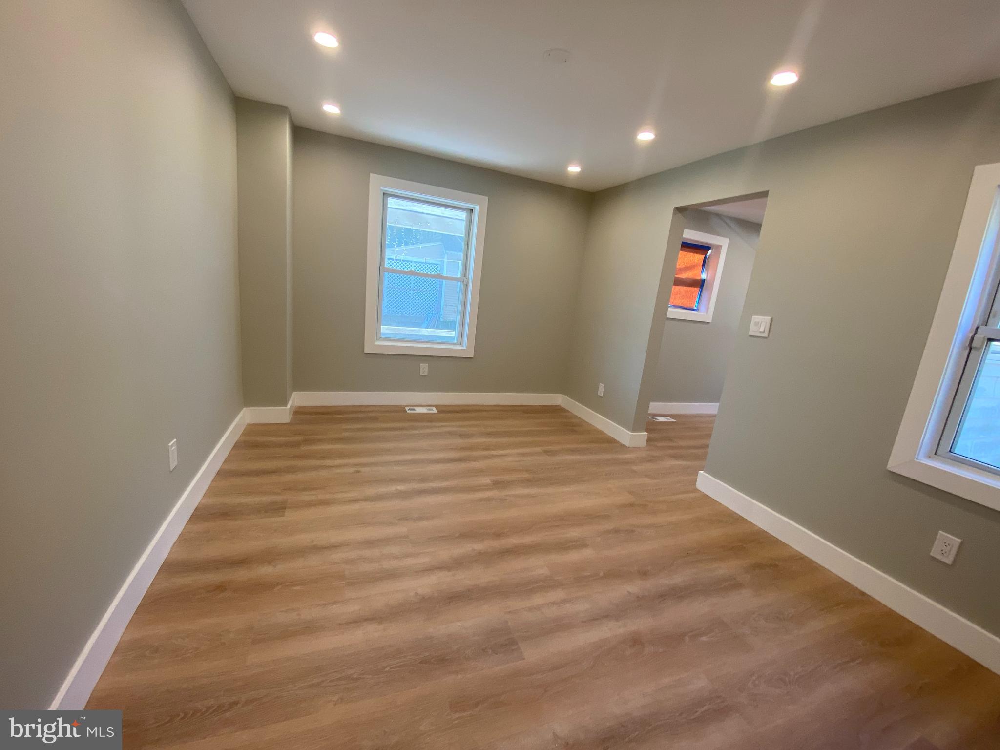 1104 Highway 77 Bridgeton, NJ 08302 - Photo 6 of 21 a view of an empty room with windows
