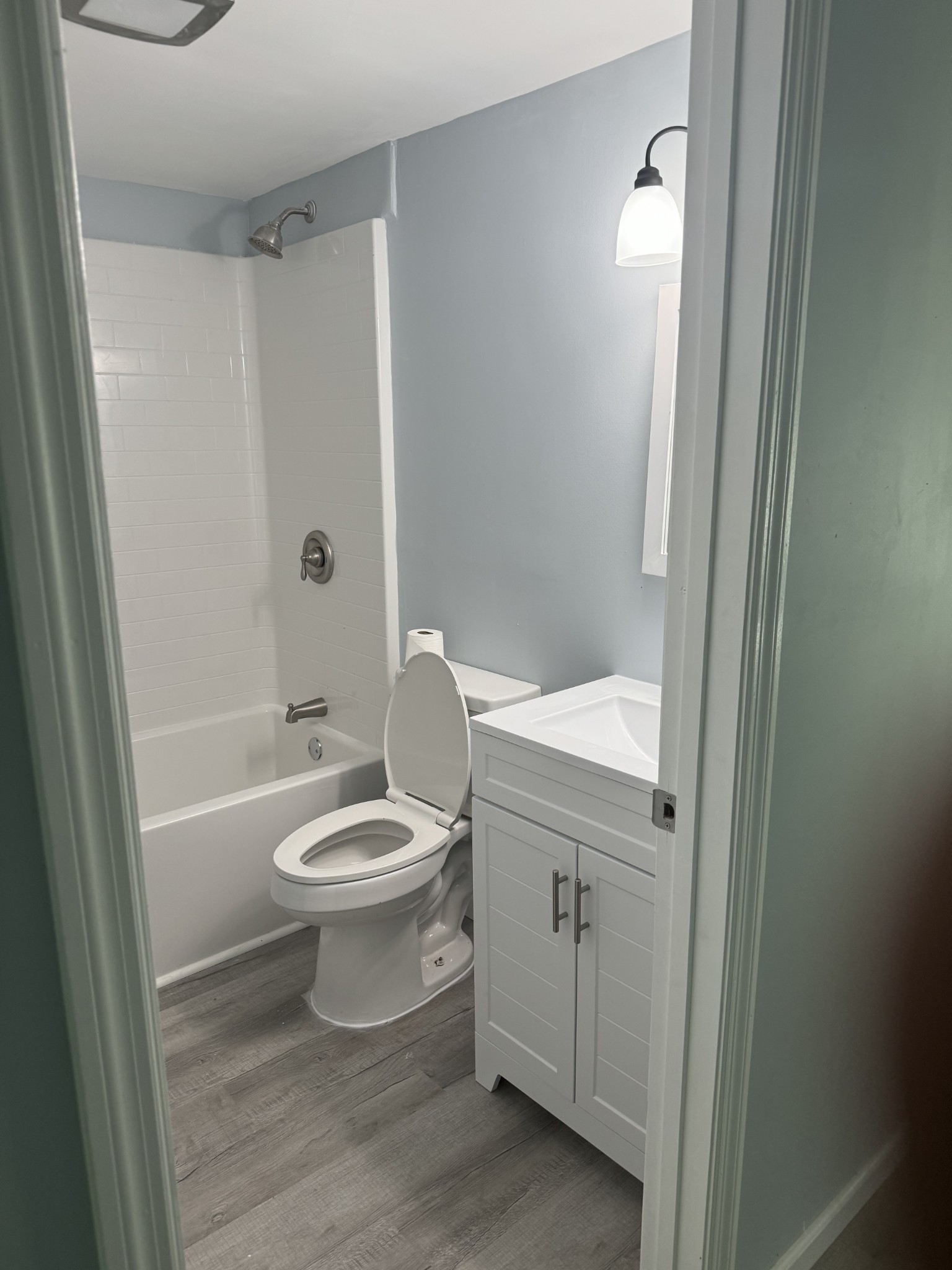 499 Carter Blake Road Tullahoma, TN 37388 - Photo 12 of 15 a bathroom with a sink a toilet and shower