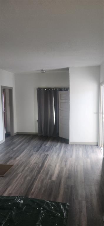 1330 Pine Street Altamonte Springs, FL 32701 - Photo 7 of 10 a view of an empty room and wooden floor