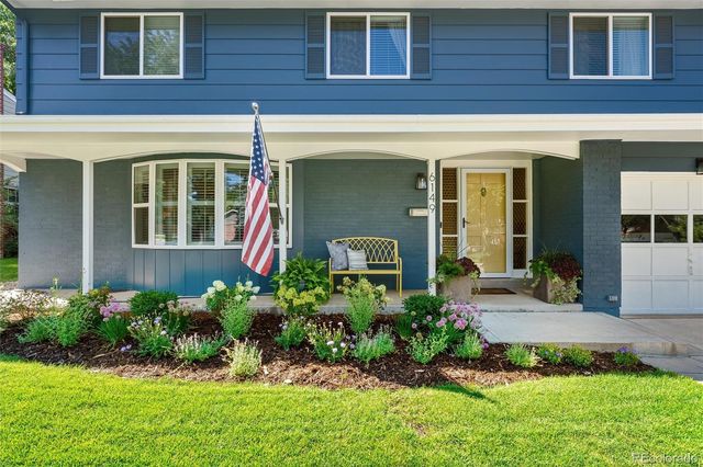 a front view of a house having yard