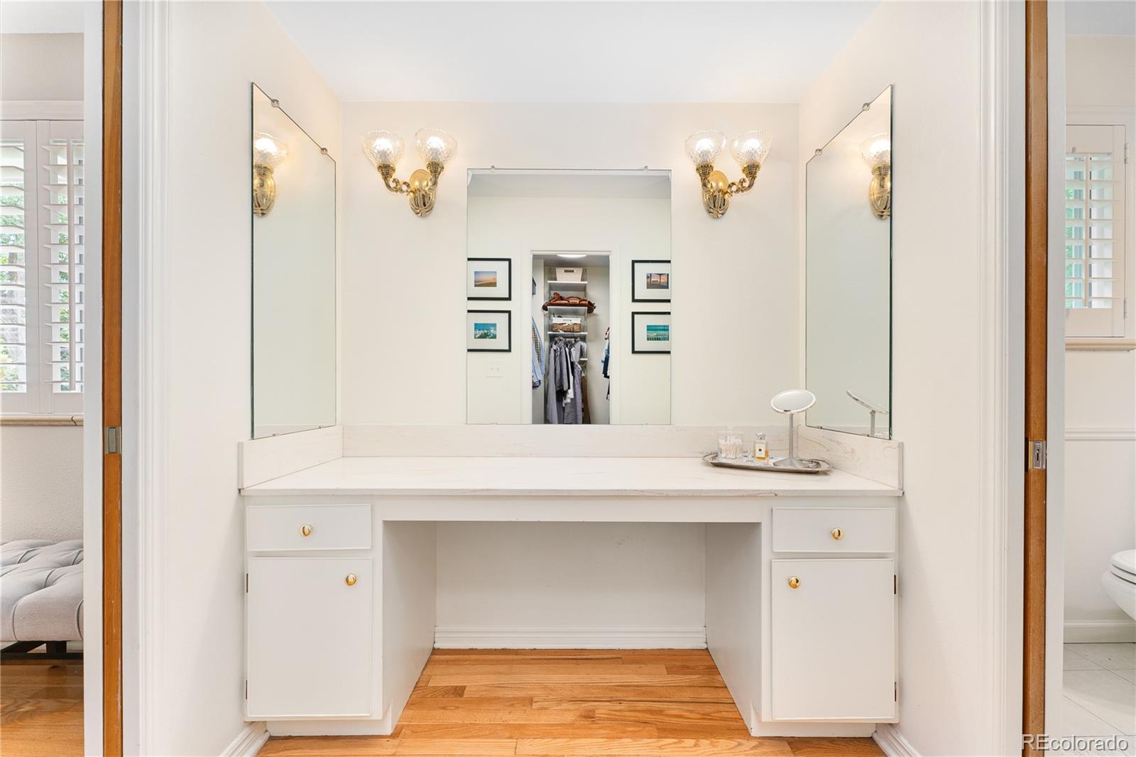 6149 South Elizabeth Way Centennial, CO 80121 - Photo 23 of 49 a bathroom with a sink and a mirror