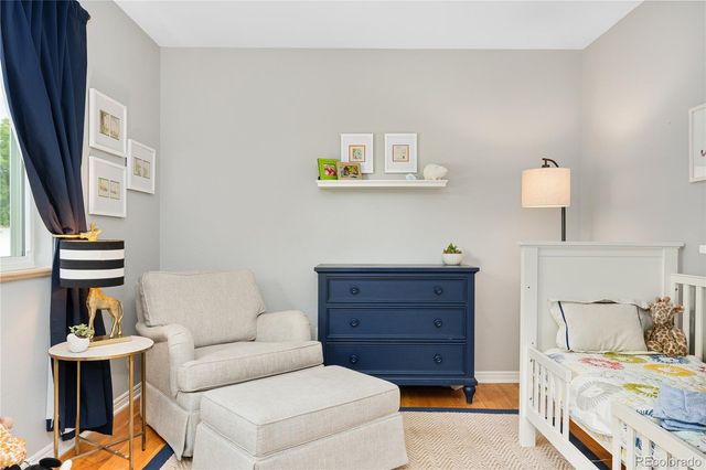 a bedroom with a bed and furniture