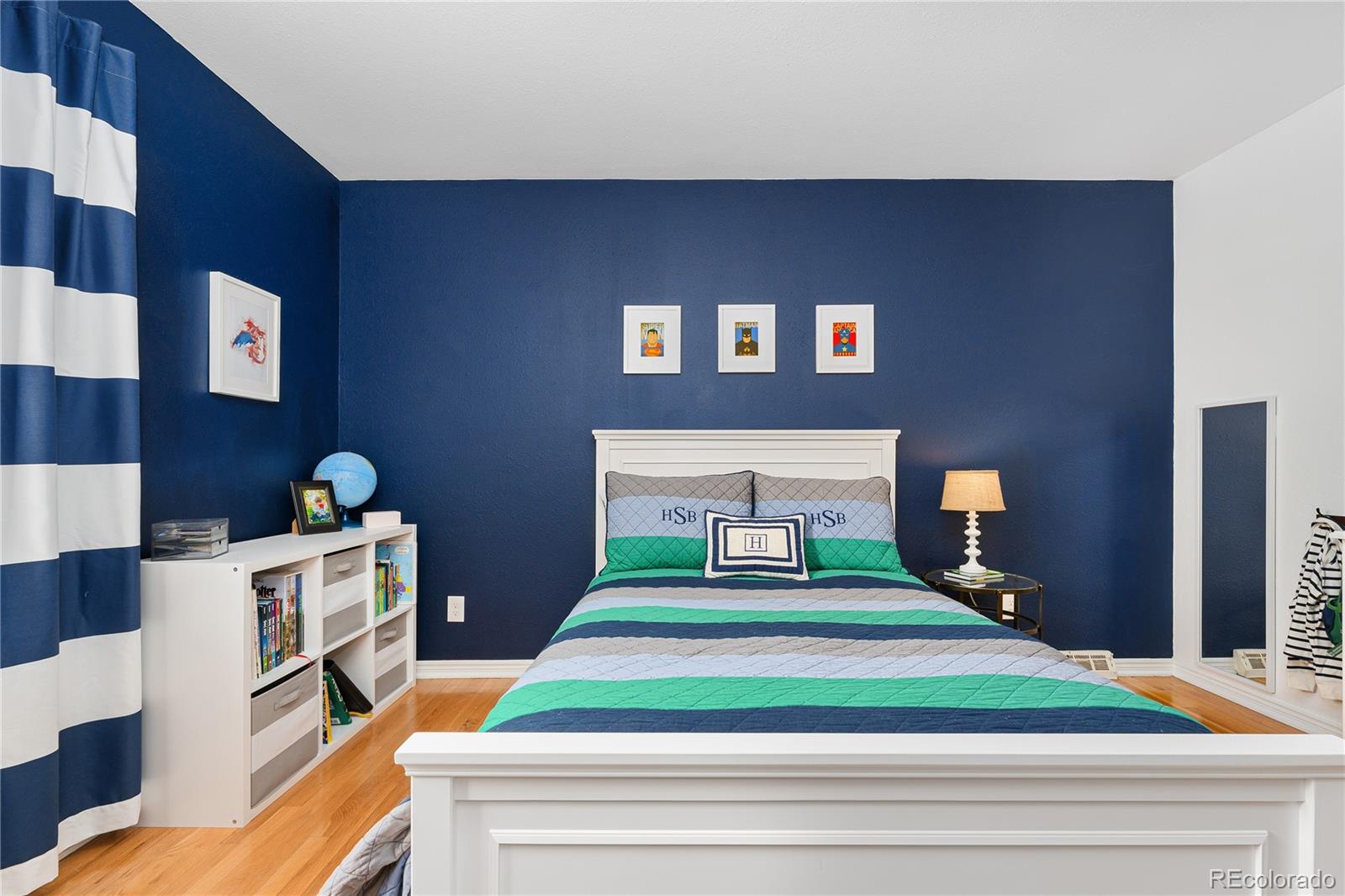 6149 South Elizabeth Way Centennial, CO 80121 - Photo 27 of 49 a living room with furniture and a lamp