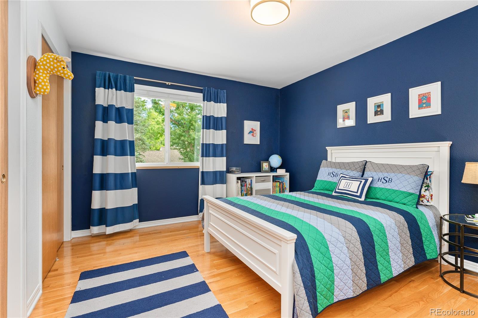 6149 South Elizabeth Way Centennial, CO 80121 - Photo 28 of 49 a bedroom with bed and a window