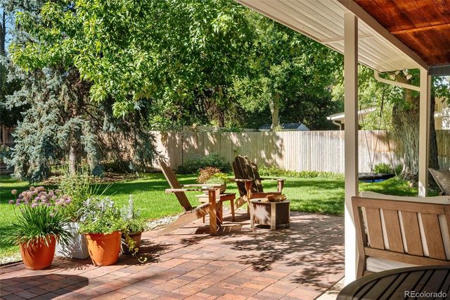a garden view with a seating space