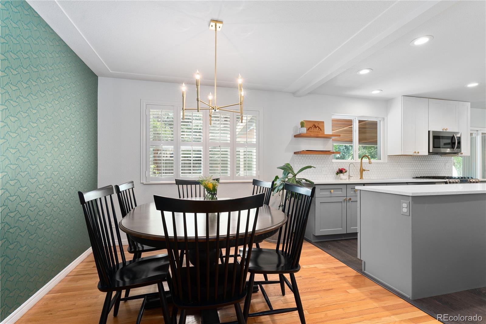 6149 South Elizabeth Way Centennial, CO 80121 - Photo 9 of 49 a view of a dining room with furniture window and outside view