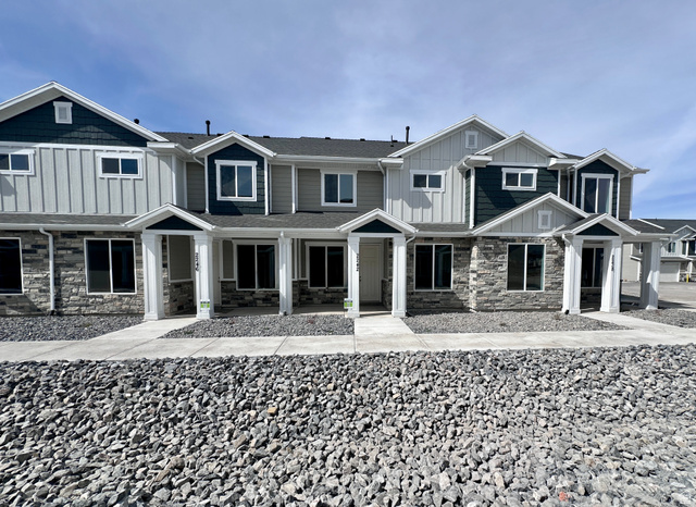 2242 South 1120 West, Unit 69 Logan, UT 84321 - Photo 3 of 26 Craftsman-style house with stone siding and board and batten siding