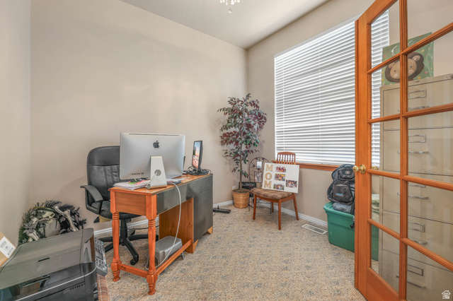 569 Elk Meadow Loop Tooele, UT 84074 - Photo 35 of 56 Office area featuring light carpet and baseboards