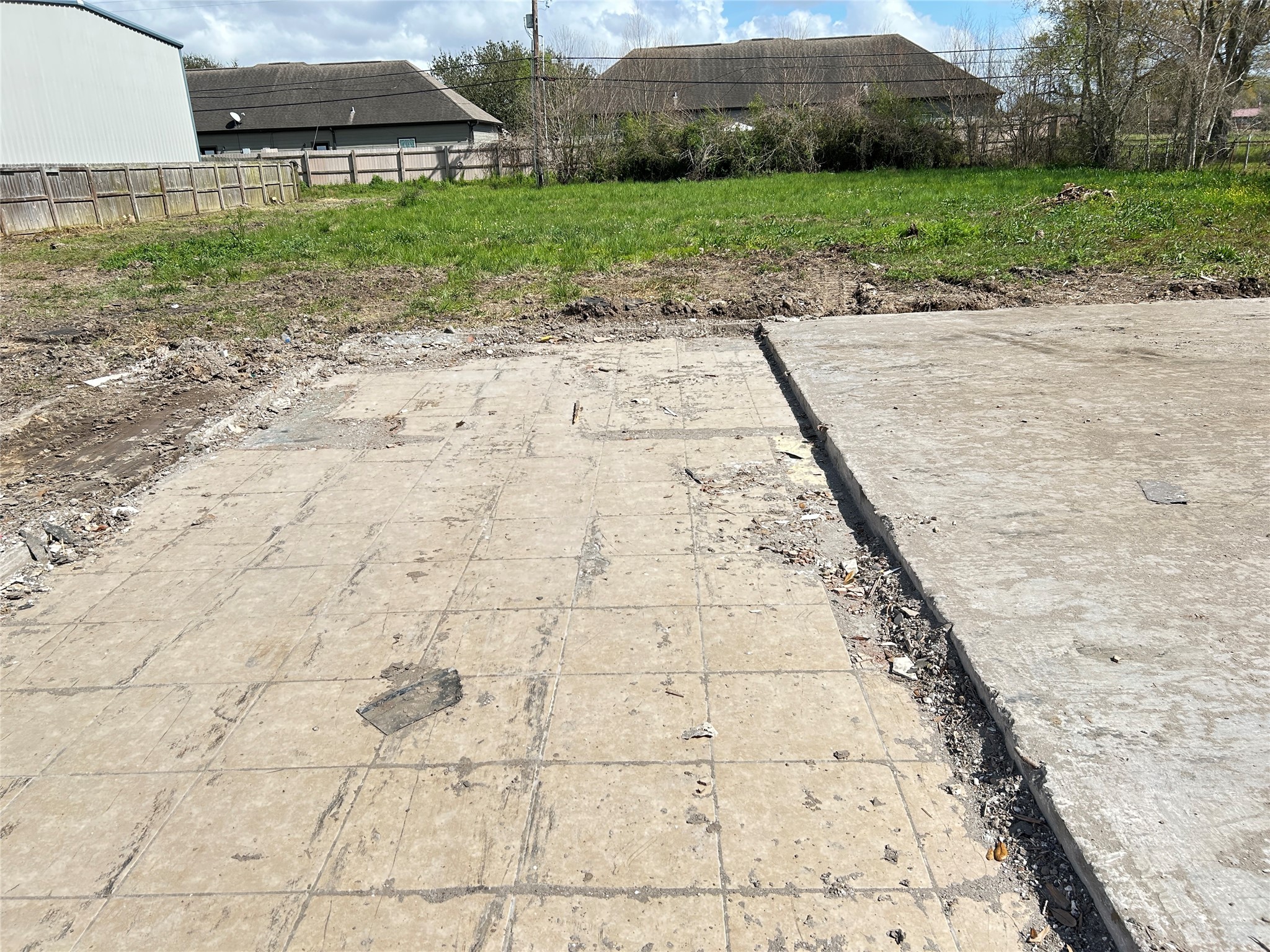 145 Blueberry Street Bridge City, TX 77611 - Photo 3 of 9 a view of a yard with plants