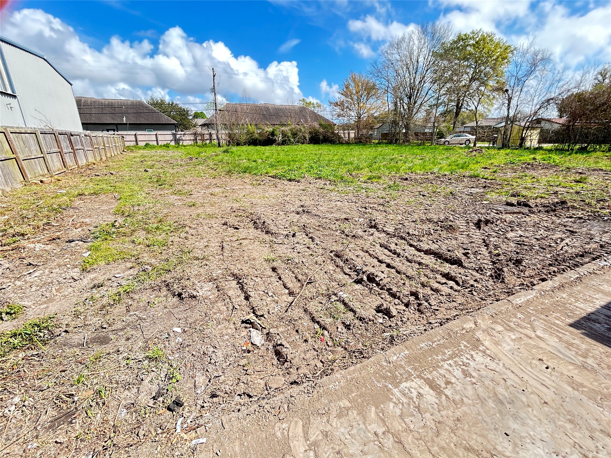 145 Blueberry Street Bridge City, TX 77611 - Photo 4 of 9 a view of a yard with yellow house