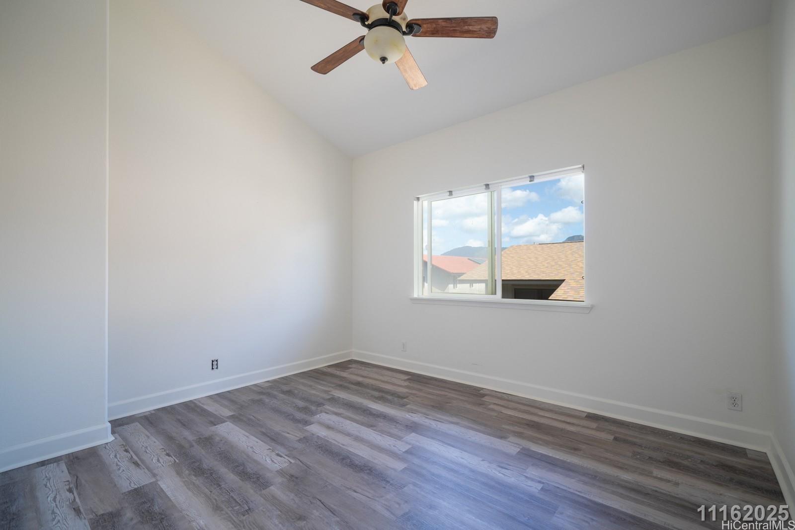 87-110 Kaukama Road, Unit B Waianae, HI 96792 - Photo 21 of 24 wooden floor in an empty room with a window