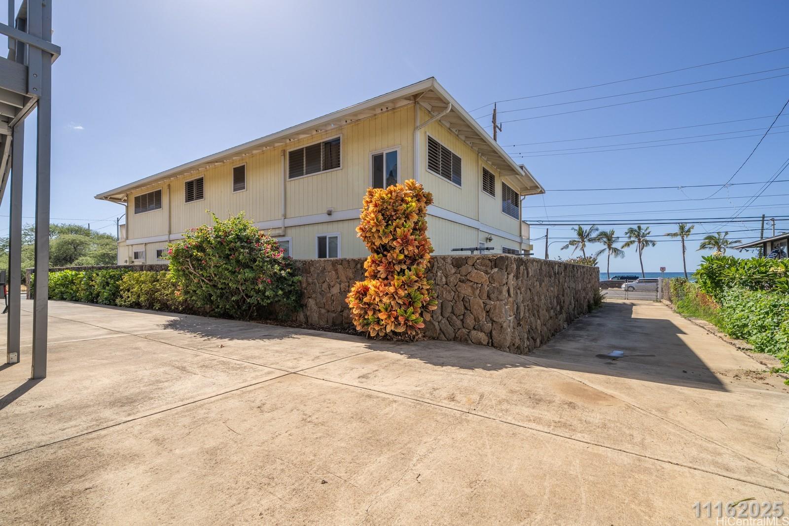 87-110 Kaukama Road, Unit B Waianae, HI 96792 - Photo 4 of 24 a view of a house with a yard