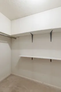 a view of a room with racks on the wall