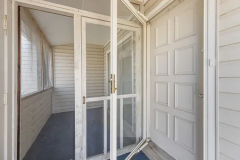 a view of a room with rack on the wall