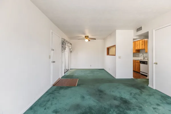 a view of entryway with kitchen