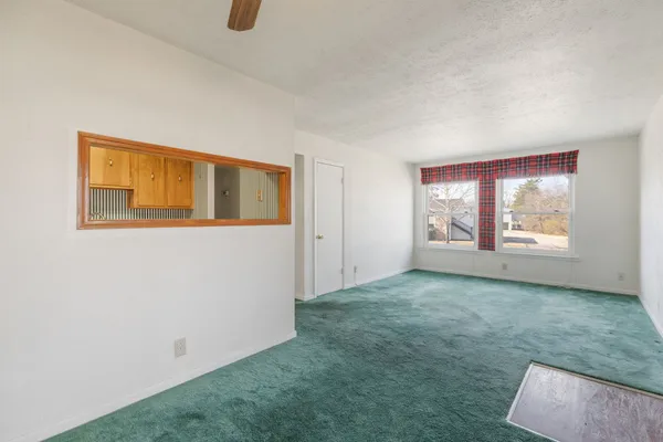 an empty room with windows