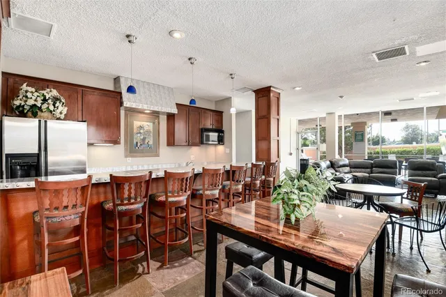 a view of a swimming pool with a lounge chairs