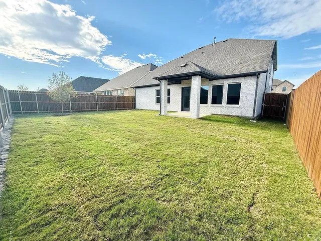a house view with a garden space