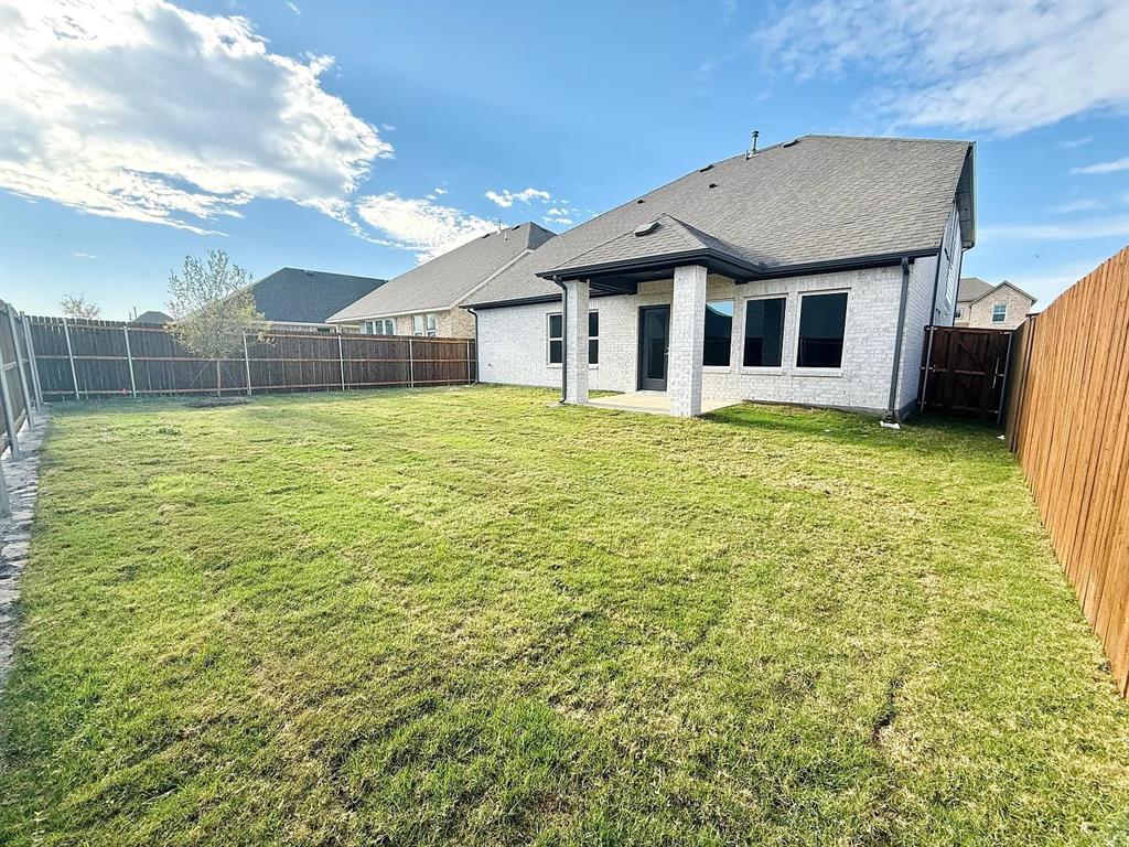 2708 Shiners Street Forney, TX 75126 - Photo 2 of 25 a house view with a garden space