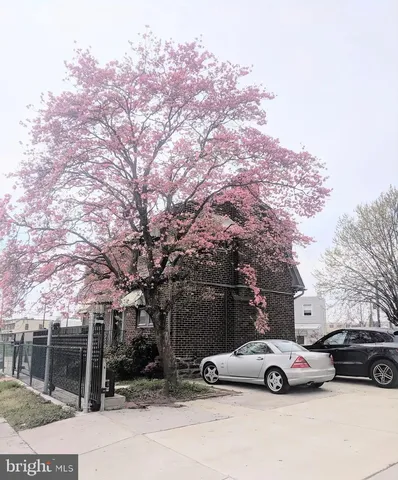 a car parked in front of a house