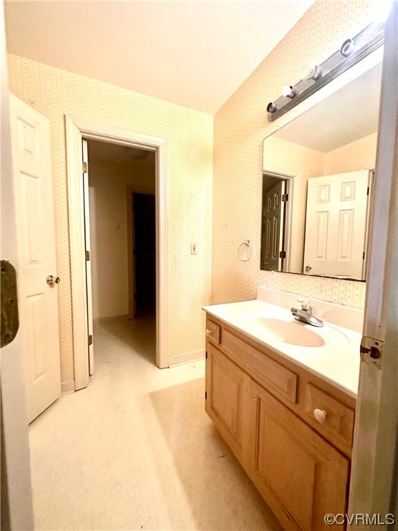 13002 Rockridge Road Chester, VA 23831 - Photo 18 of 49 a bathroom with a sink and a mirror
