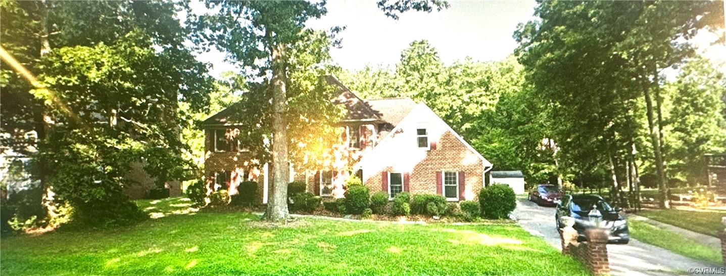 13002 Rockridge Road Chester, VA 23831 - Photo 2 of 49 a view of house with backyard