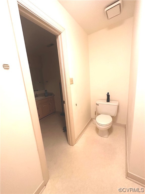 13002 Rockridge Road Chester, VA 23831 - Photo 21 of 49 a bathroom with a sink and a toilet