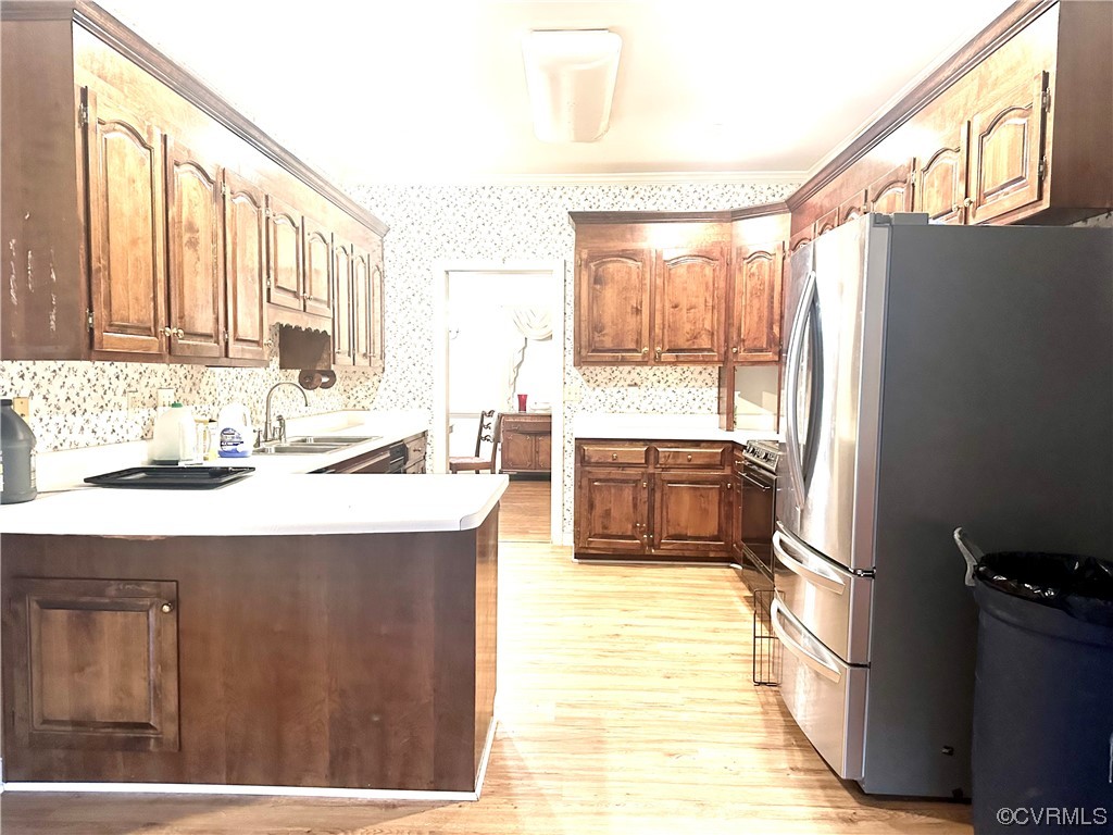 13002 Rockridge Road Chester, VA 23831 - Photo 27 of 49 a kitchen with stainless steel appliances a sink cabinets and a large window