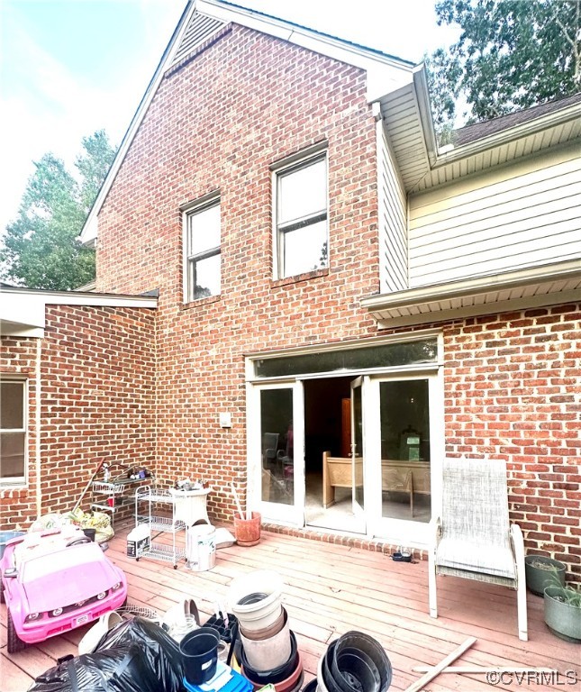 13002 Rockridge Road Chester, VA 23831 - Photo 31 of 49 a view of a patio with couches table and chairs and potted plants