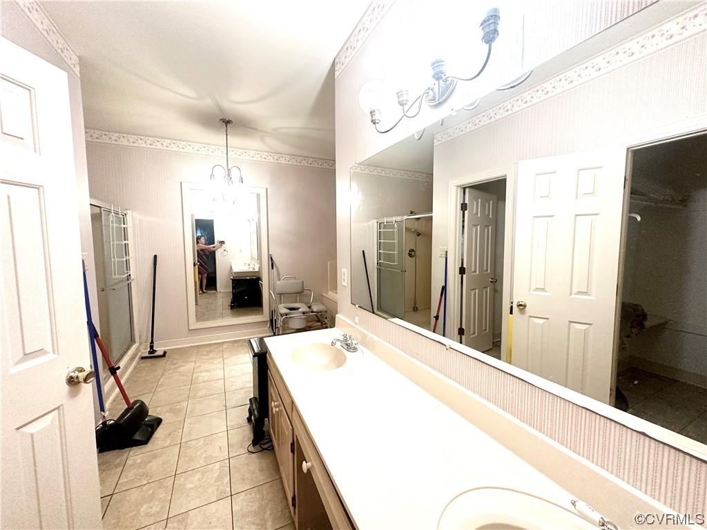 13002 Rockridge Road Chester, VA 23831 - Photo 49 of 49 a spacious bathroom with a double vanity sink and a mirror
