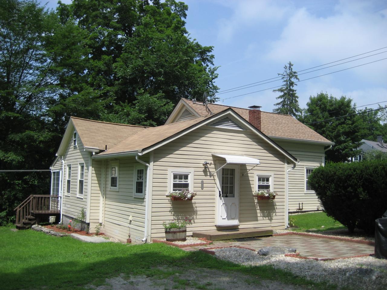 2 Tolland Road Sandisfield, MA 01255 - Photo 2 of 8 a view of a house with a yard