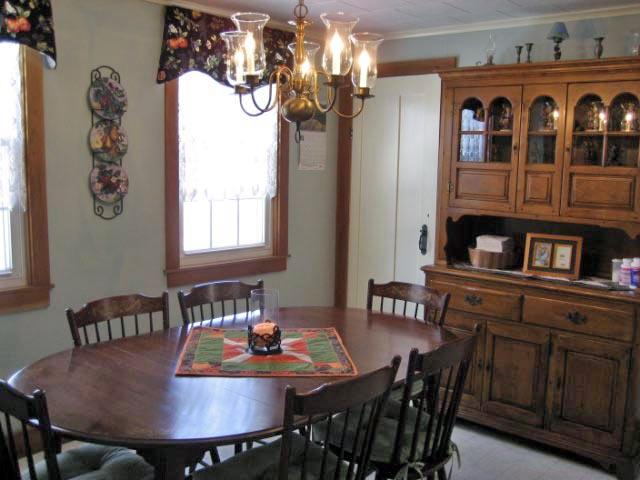 2 Tolland Road Sandisfield, MA 01255 - Photo 3 of 8 a view of a dining room with furniture and chandelier