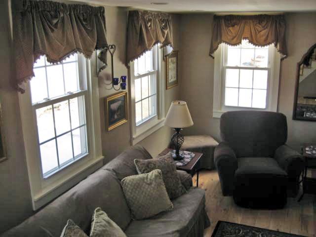 2 Tolland Road Sandisfield, MA 01255 - Photo 4 of 8 a living room with furniture and a window