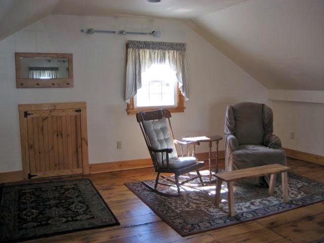 2 Tolland Road Sandisfield, MA 01255 - Photo 7 of 8 a living room with furniture and a rug