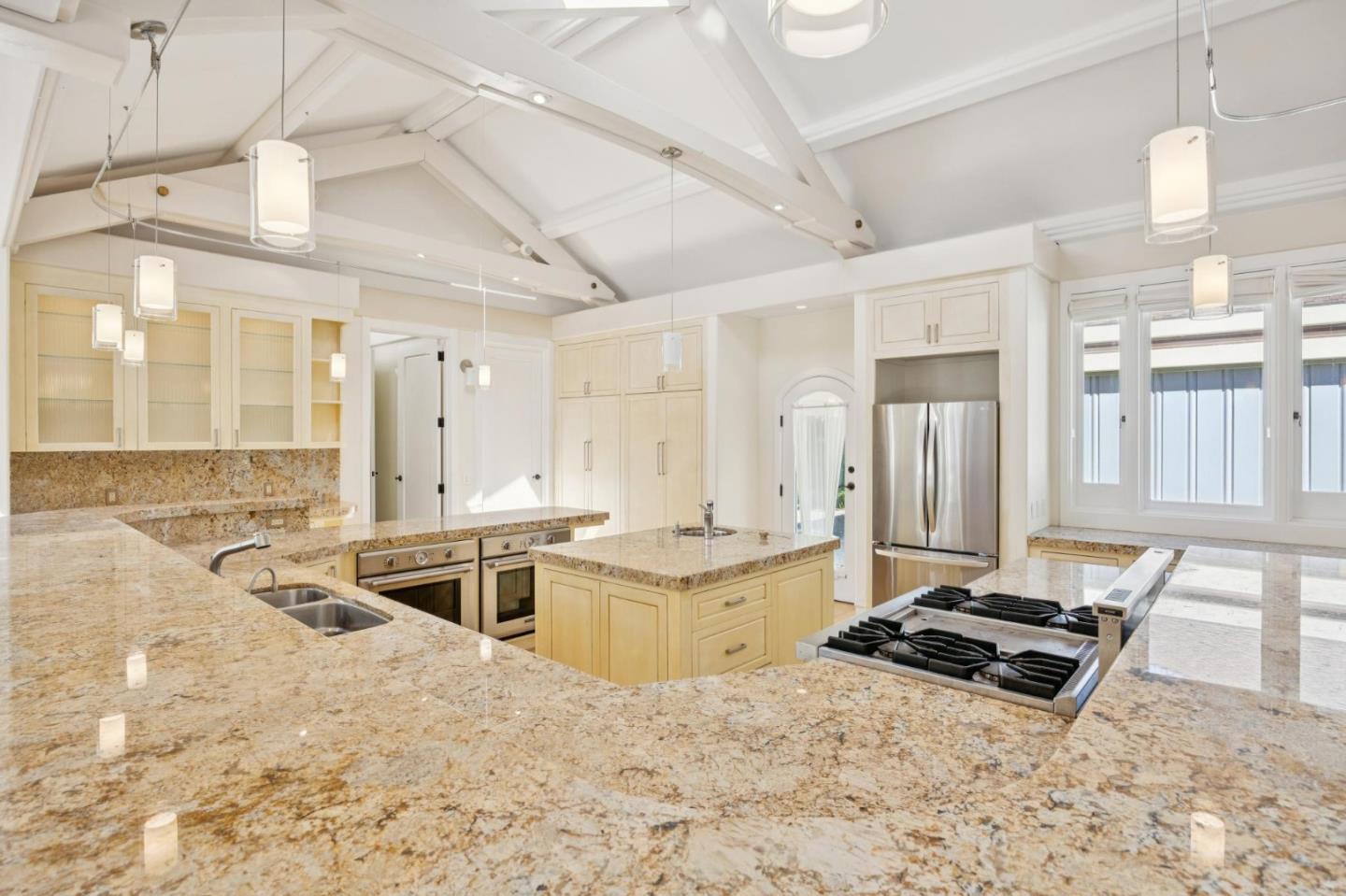 39 Faxon Road Atherton, CA 94027 - Photo 7 of 15 a large kitchen with a stove a sink and a refrigerator