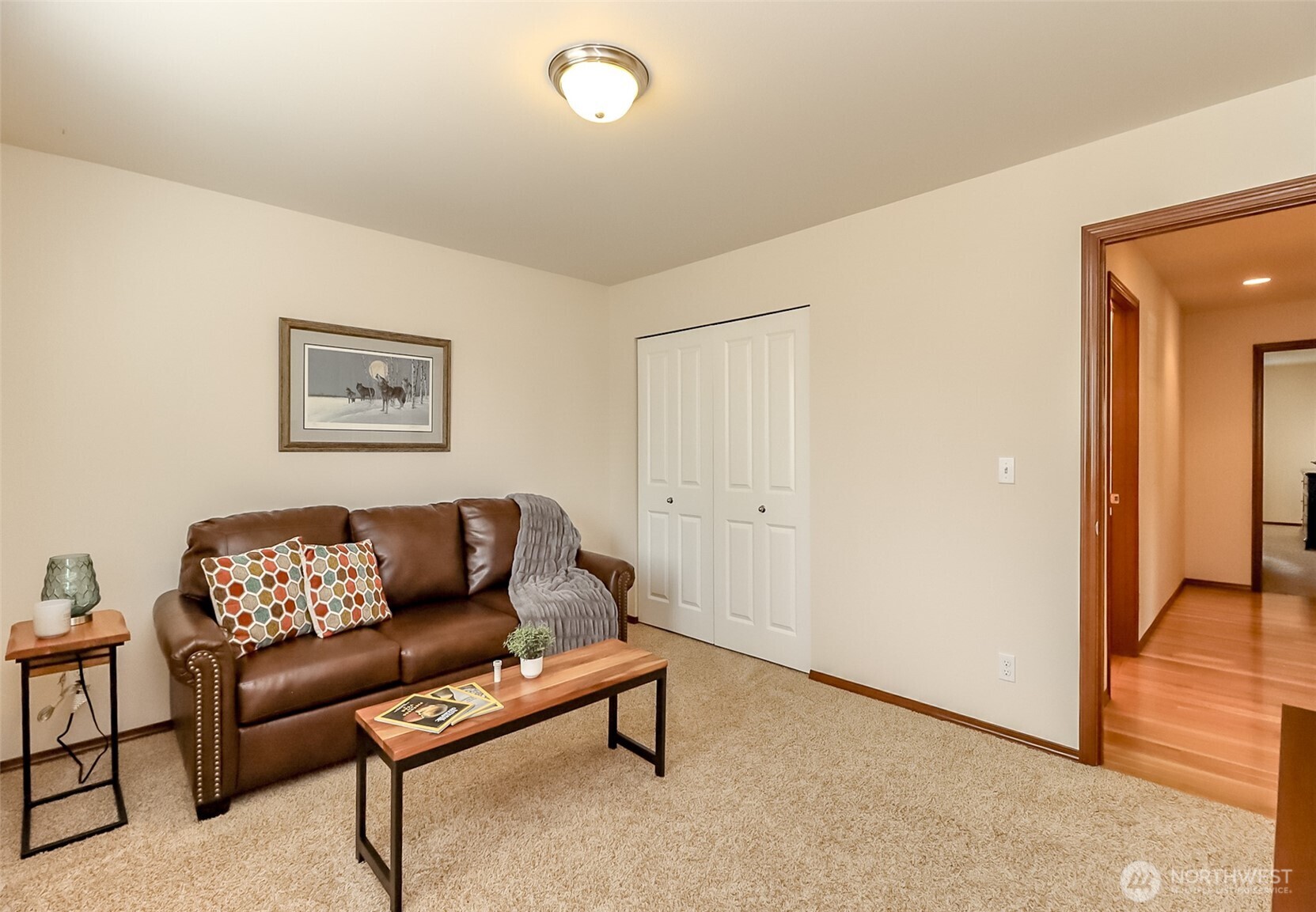 315 Dennis Way Monroe, WA 98272 - Photo 23 of 37 a blue couch sitting in a living room with a couch