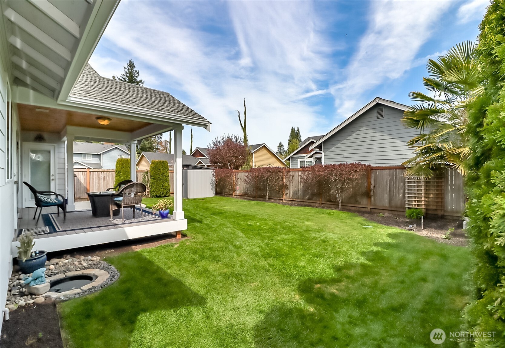 315 Dennis Way Monroe, WA 98272 - Photo 31 of 37 a view of house with backyard and patio