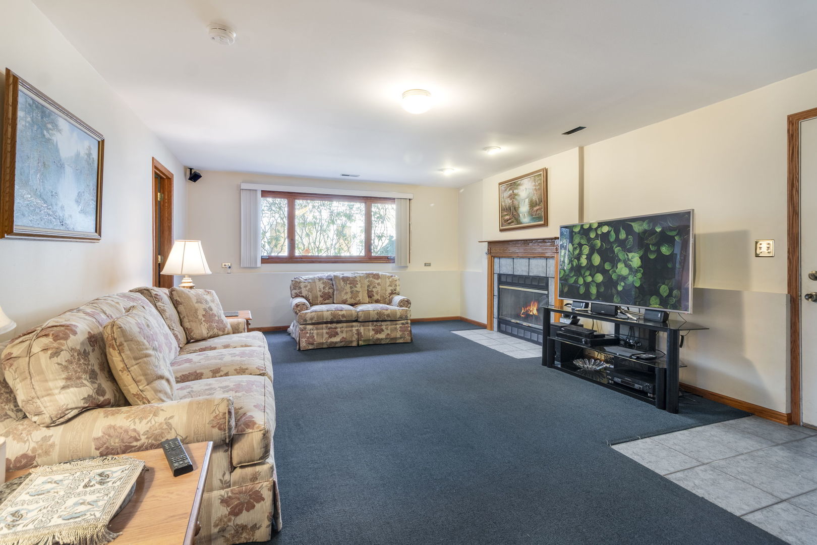 16641 West Oneida Drive Lockport, IL 60441 - Photo 17 of 24 a living room with furniture and a large window