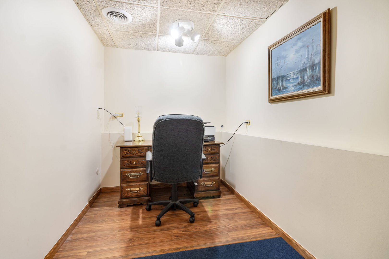16641 West Oneida Drive Lockport, IL 60441 - Photo 20 of 24 a view of a workspace with furniture and wooden floor