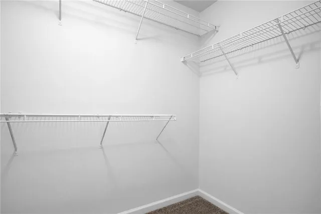 a view of a room with racks on the wall