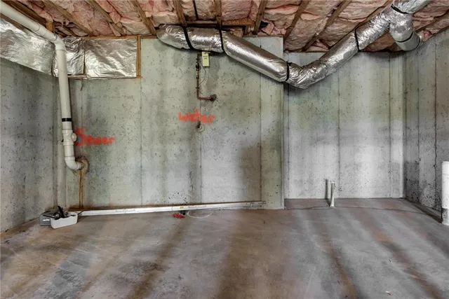 a view of a room with wooden walls