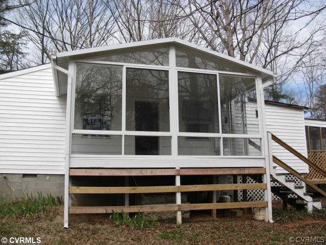 2390 Sheppard Town Road Maidens, VA 23102 - Photo 12 of 12 a front view of a house with a large window