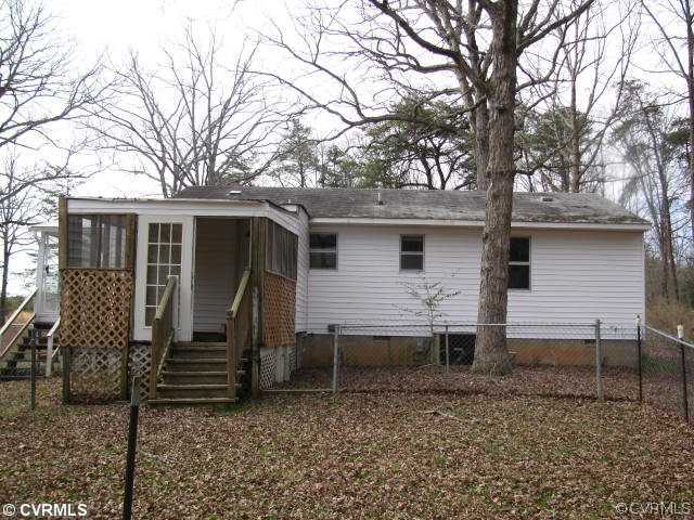 2390 Sheppard Town Road Maidens, VA 23102 - Photo 2 of 12 front view of a house with two trees