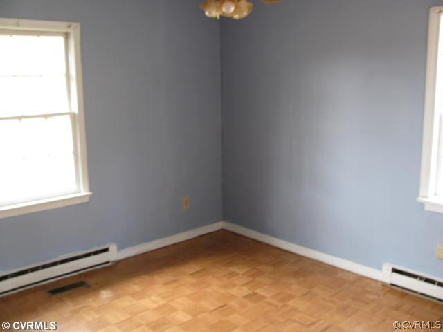 2390 Sheppard Town Road Maidens, VA 23102 - Photo 5 of 12 an empty room with a window