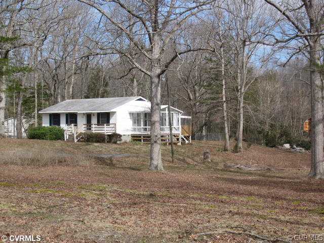 2390 Sheppard Town Road Maidens, VA 23102 - Photo 6 of 12 a view of a house with a yard